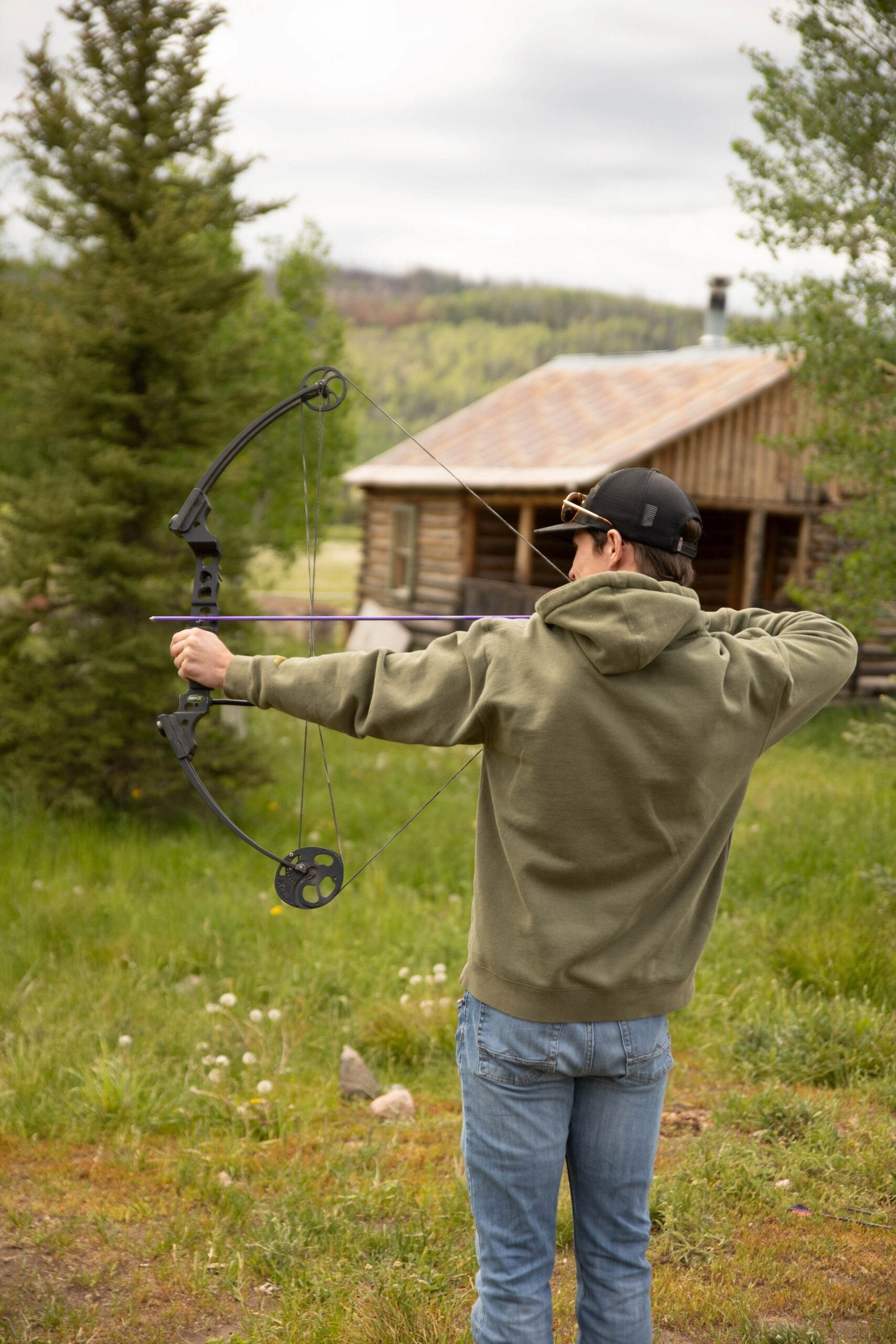 Teen engaged in our archery activity