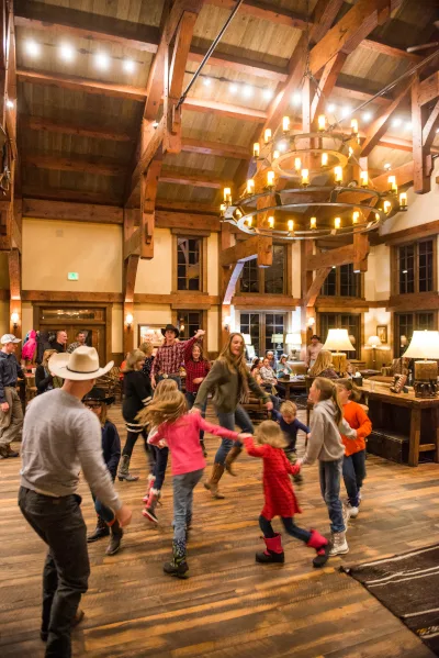 guests dancing at a dude ranch