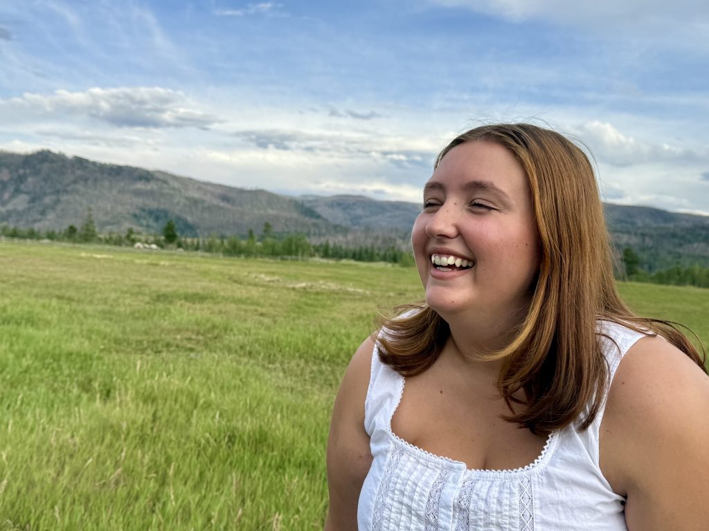 girl smiling on ranch