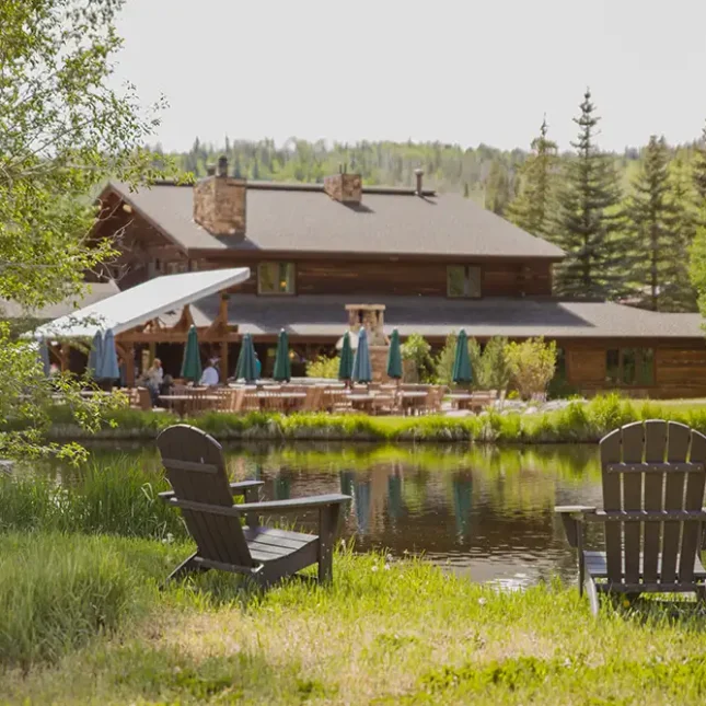 The pond sits beside the outdoor patio to our main lodge at the center of the ranch